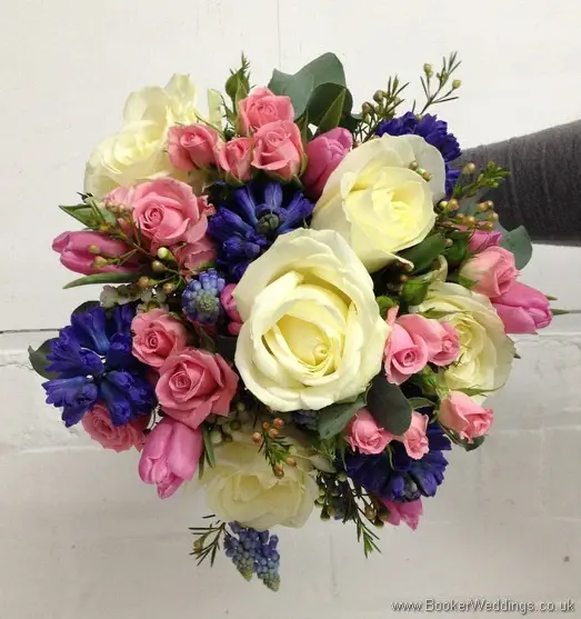 Semi Wild Brides Hand Tied Bouquet of Pale Pink, Blue and Cream with Cream Roses, Pink Spray Roses, Pin kTulips, Wax Flowers, Blue Muscari and Hyacinth