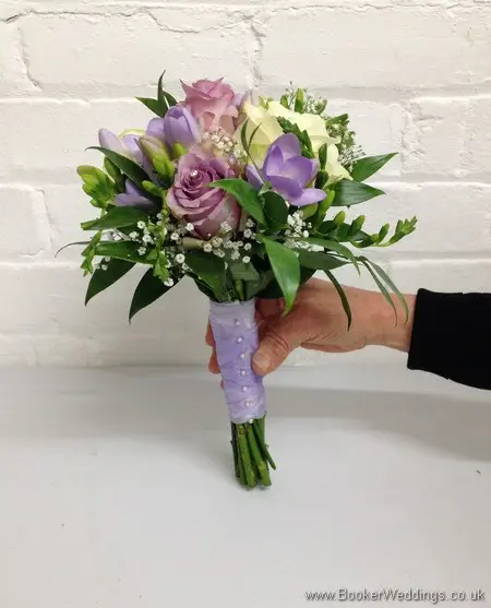 Lilac and Cream Roses with Lilac Lissianthus, Lilac Freesia and Gypsophila Hand Tied Bridesmaid Bouquet SIde View