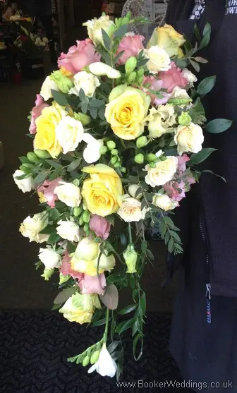 Pastel Coloured Hand tied Bridal Shower Bouquet with roses, spray roses, freesia, bouvarida and lissianthus Side View 2