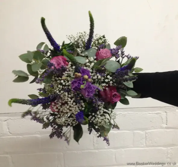 Just Picked Country Flowers in purples and lilacs with grey foliage with roses, lissianthus, veronica, gypsy grass and eucalyptus Bridesmaid Bouquet