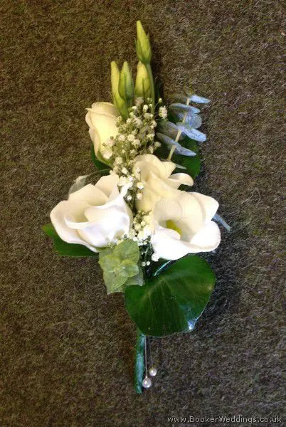 All white lisianthus and gypsophila pin corsage