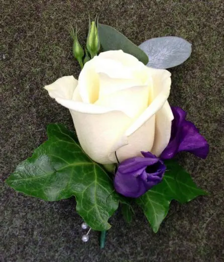 Purple and Cream Rose Grooms Buttohole