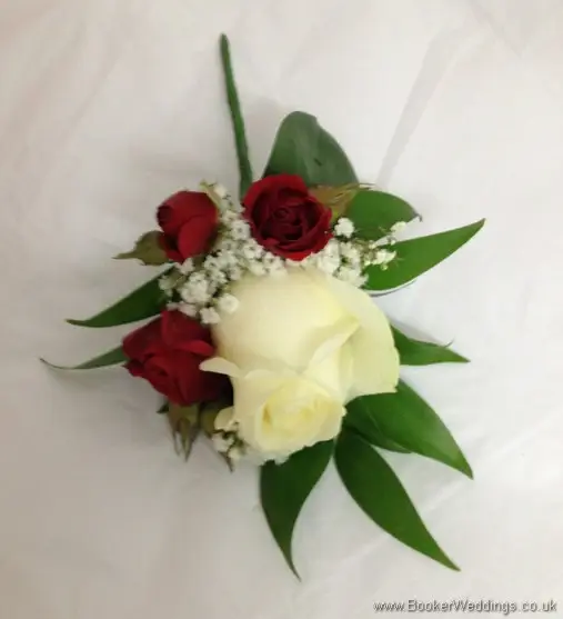 Red and White Wedding Grooms Buttonhole with Red and White Roses & Gypsy Grass