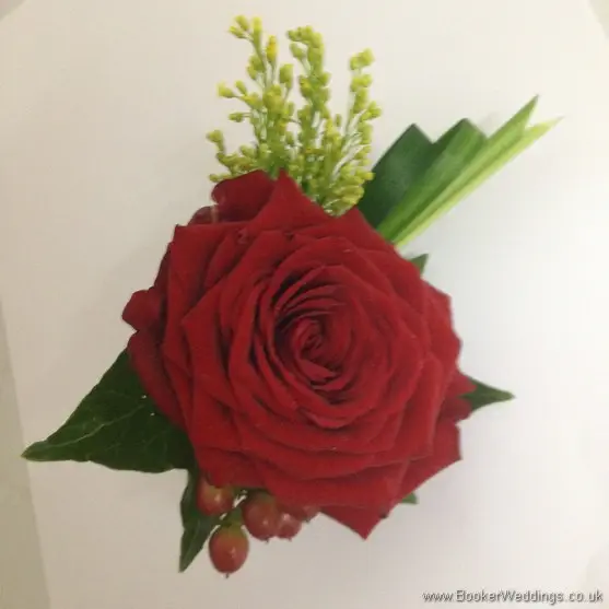Autumnal Colours Grooms Buttonhole with Red Rose, Yellow Solidaster and Red Hypernicum Berries