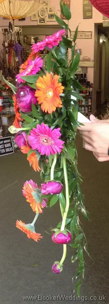 Vibrant Pink and Orange Gerbera Brides Shower Bouquet Side View