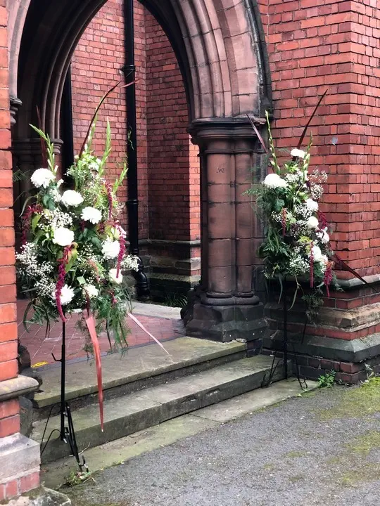 White and Burgundy Wedding Pedestals at Church