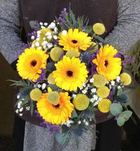 Yellow and Blue Brides Bouquet Gerbea Craspedia Eryngium and Gypsophilia