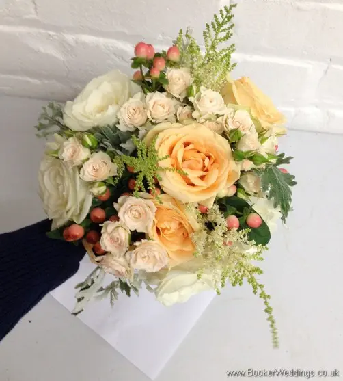 Wild Peaches & Cream Country Garden Bridal Bouquet with roses, spray roses, astilbe, hypernicum berries & grey senicio leaves