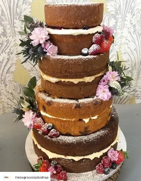 Three Graces Wedding Cake With Flowers