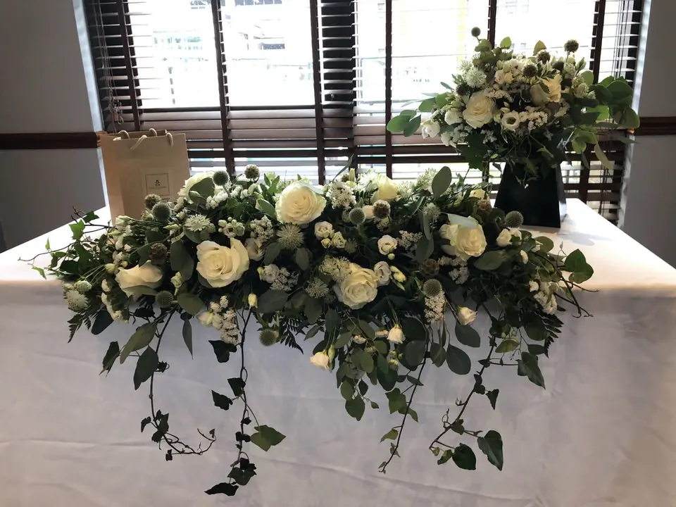 Rose Lisianthus and Eucalyptus Registrar Arrangement