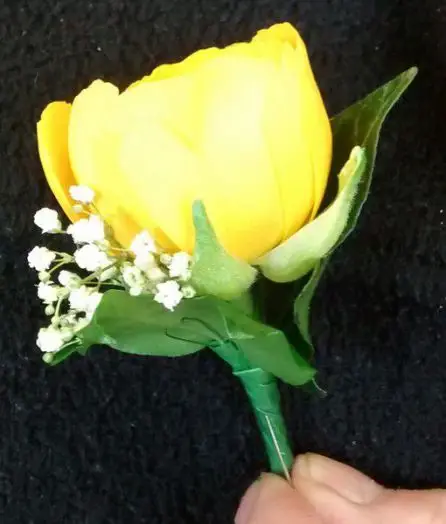 Yellow ranunculus and Gipsofila Buttonhole