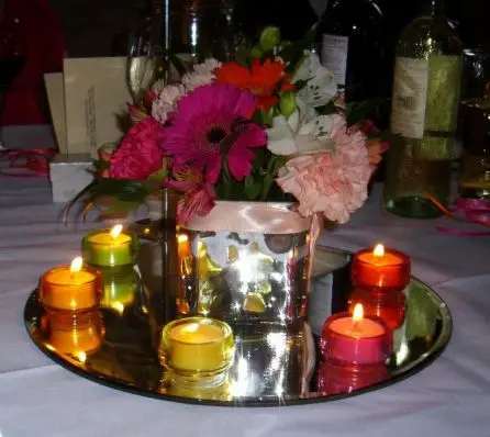 Table arrangements of Germini and Carnations 