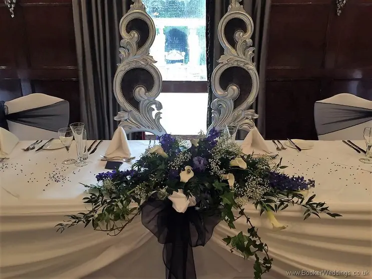 White calla lily, blue delphinium and gypsy grass top table arrangement at the Hallmark Hotel Liverpool South