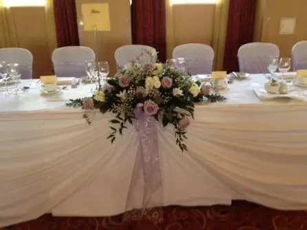 Lilac and cream top table arrangement